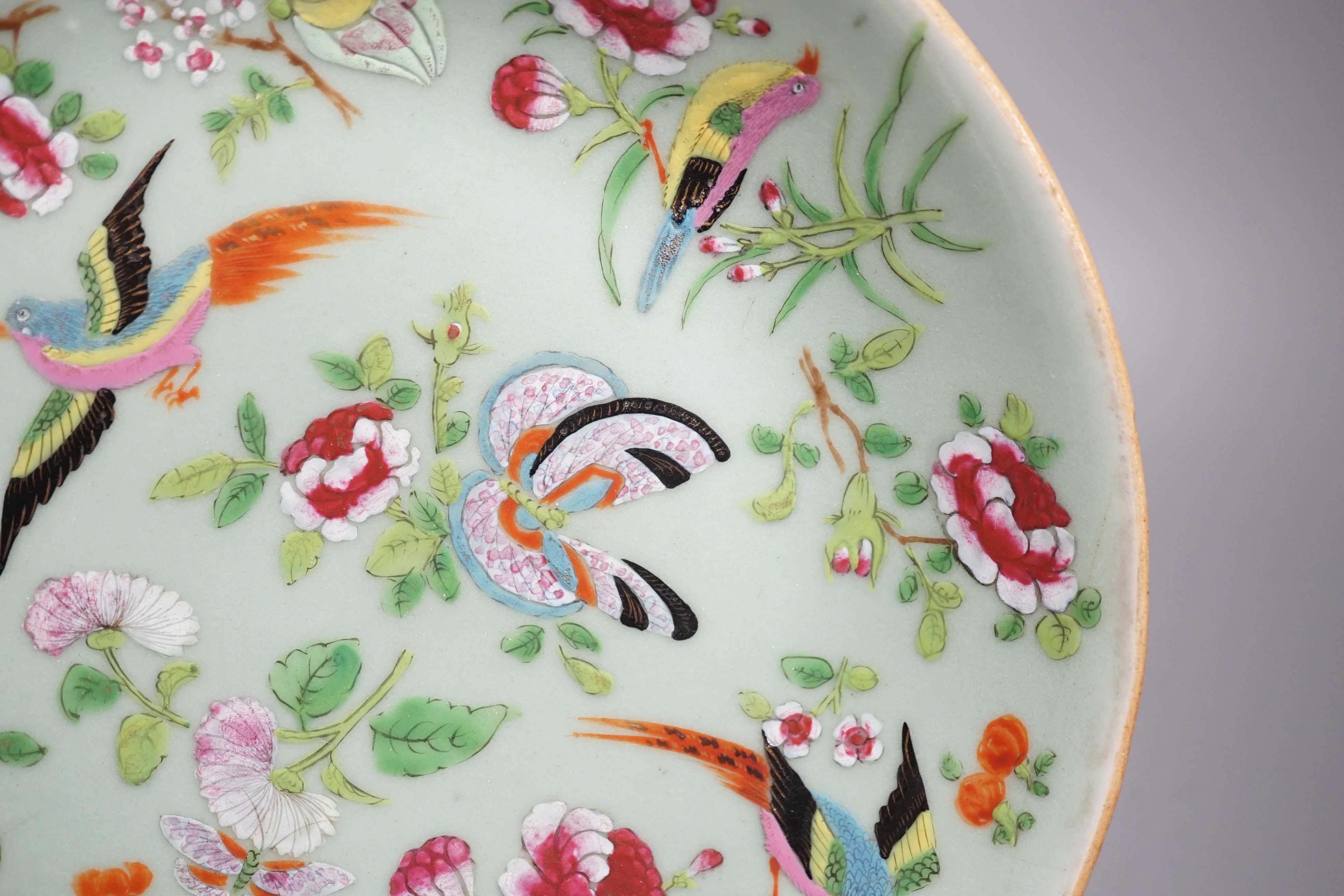 A Chinese celadon ground famille rose plate, Daoguang mark and of the period. 26cm diameter